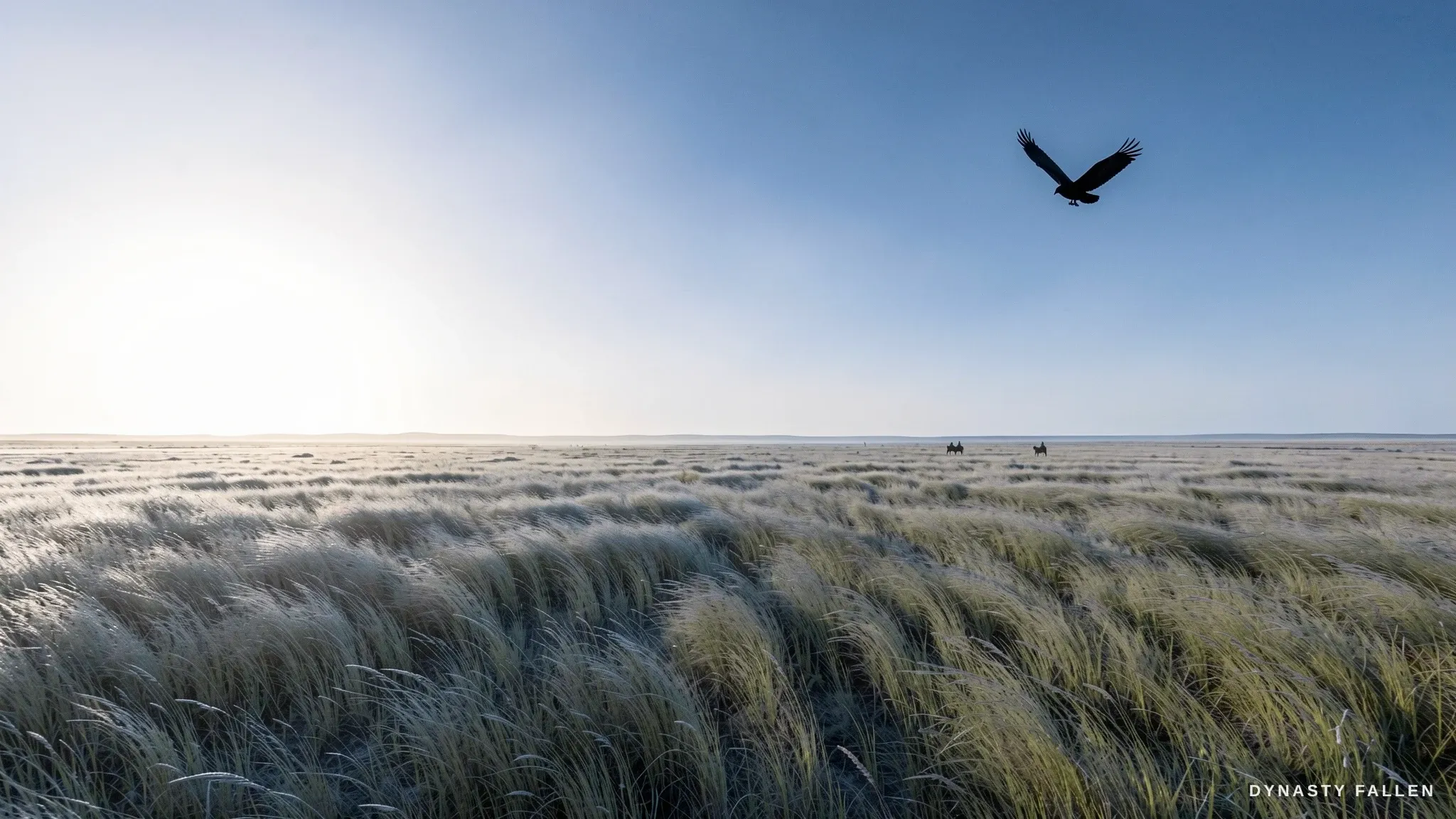 The open steppe runs to the horizon under a cold blue dawn, knee-high yellow-green grass to the sky.