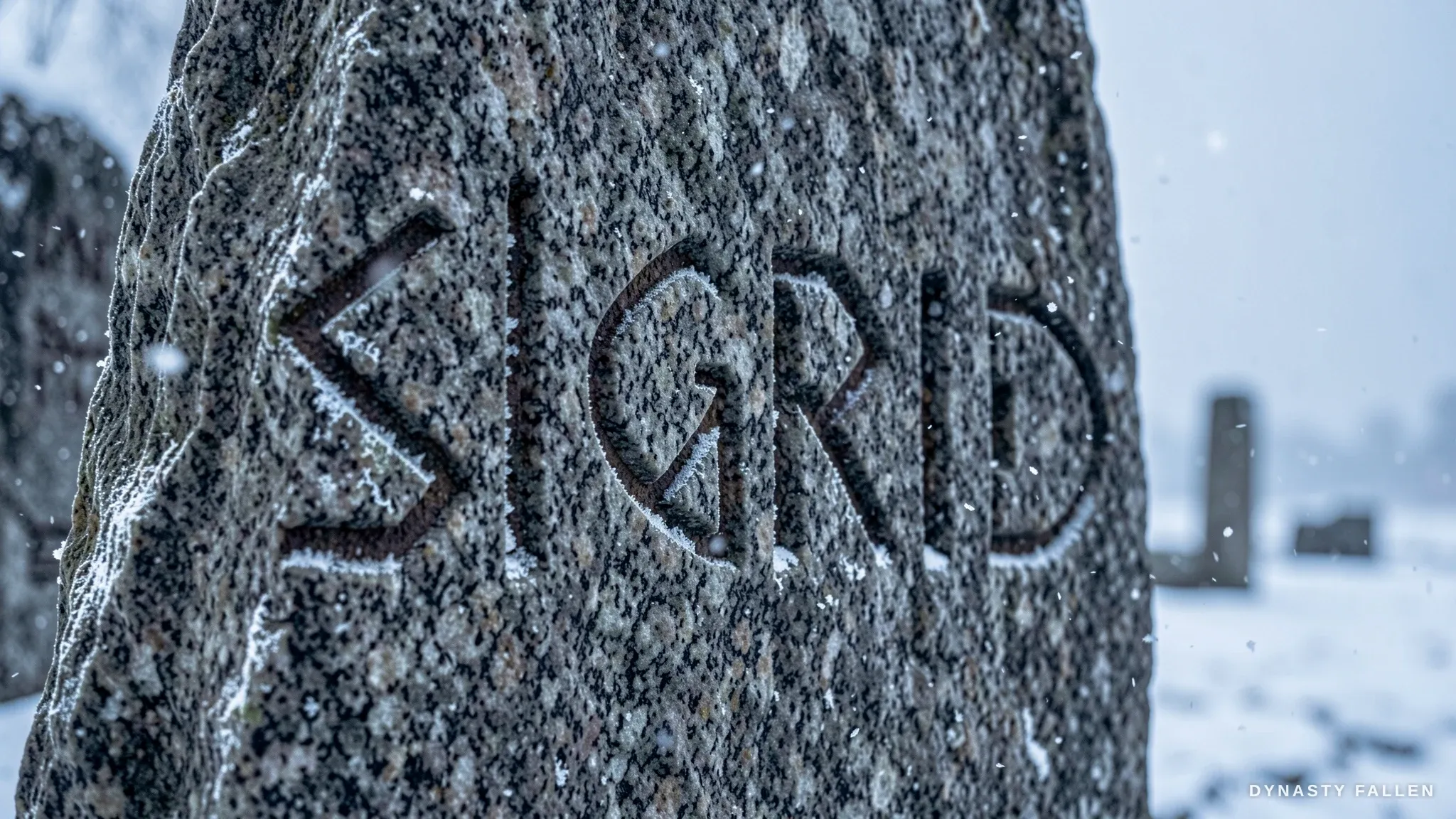 An extreme close-up of the weathered grey Rune Stone from si.