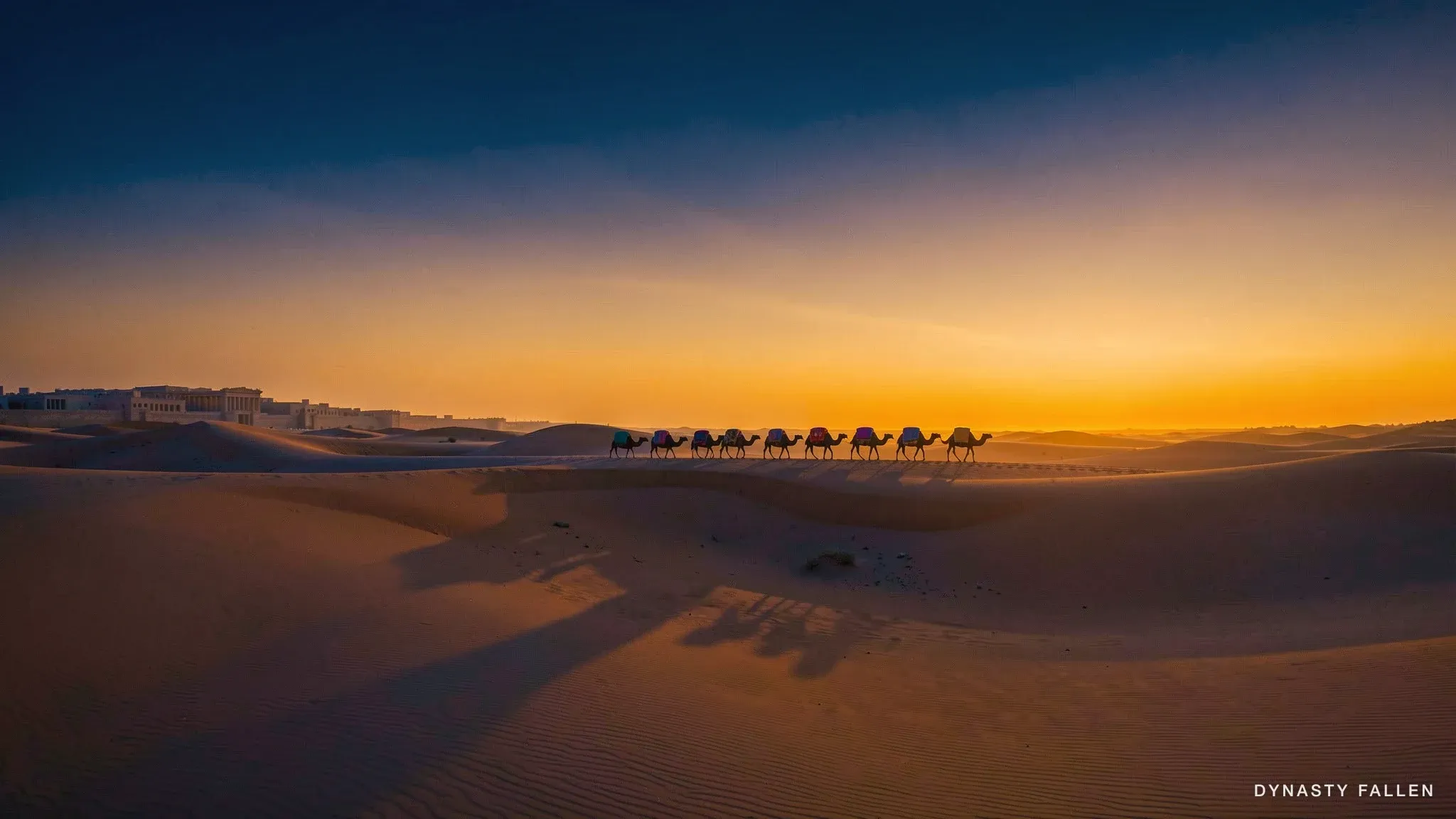 Wide Desert Vista at dusk dominates the frame, the horizon banded in deep amber.